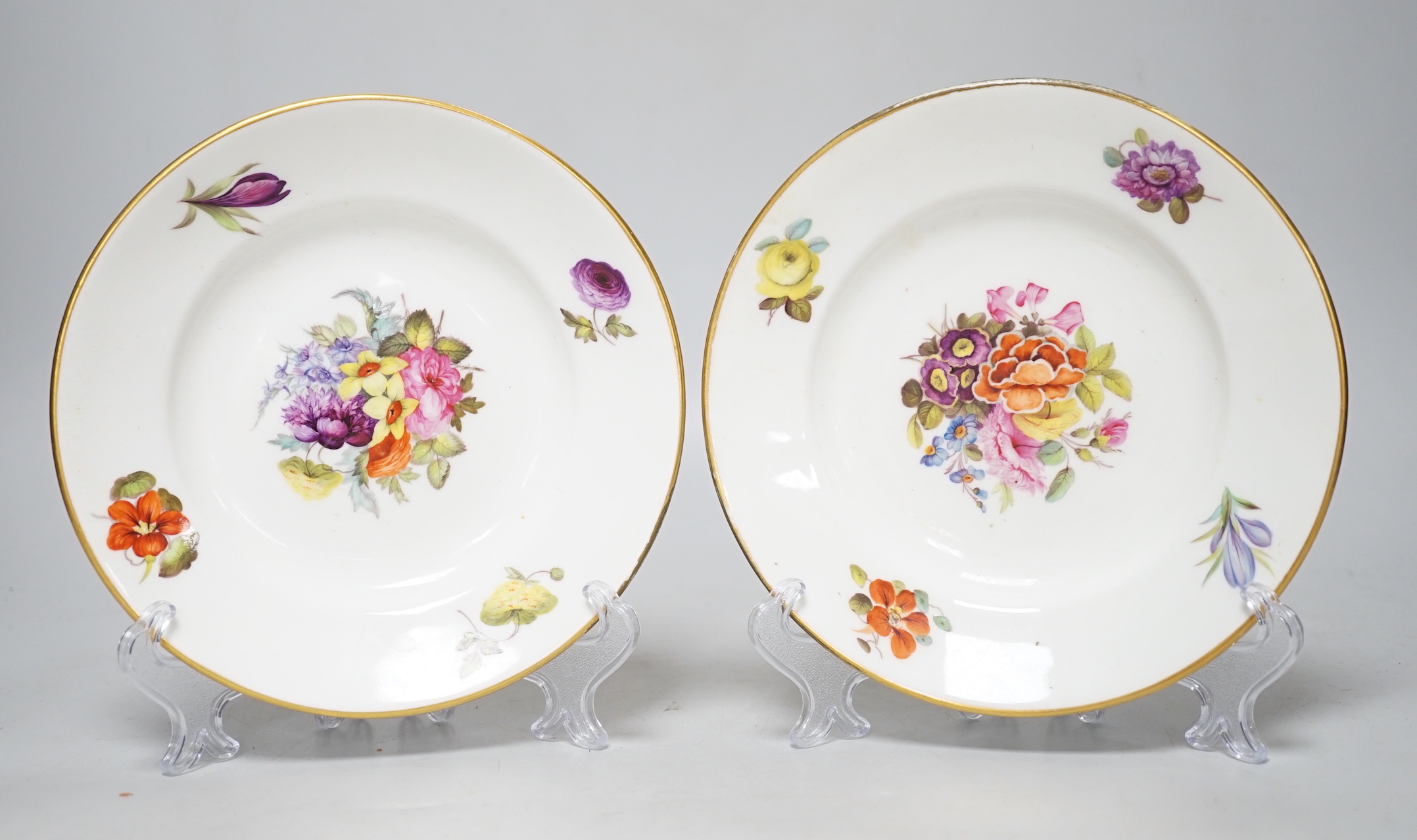 A pair of 19th century Derby floral small plates with gilded decoration, probably painted by Webster, c.1820, each 17cm in diameter